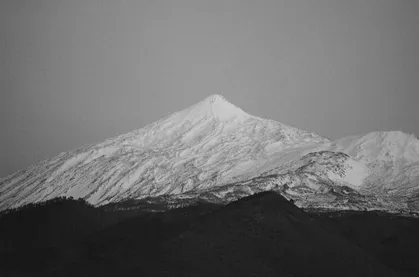 Snow on the slopes of Mount Teide, in black and white.