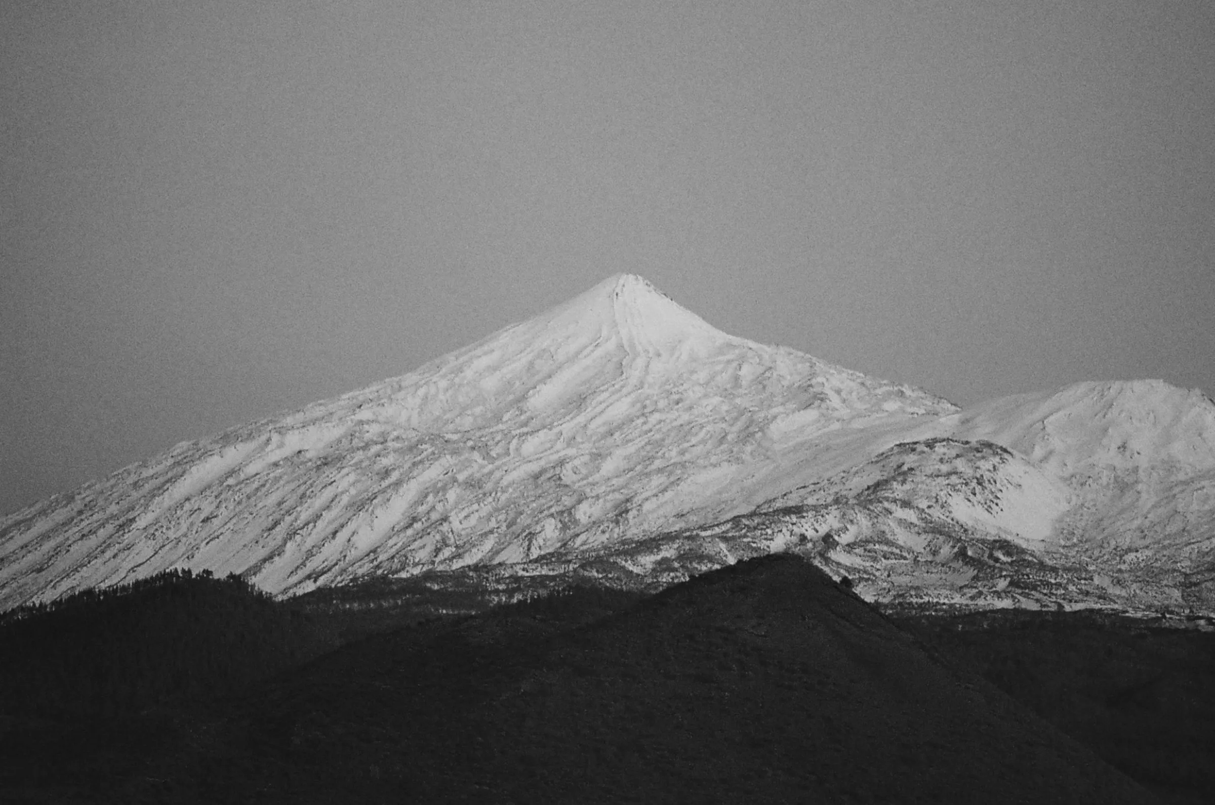 Snow on the slopes of Mount Teide, in black and white.